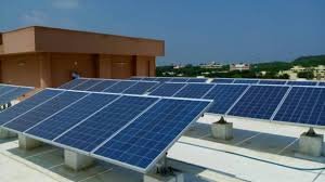 Residential rooftop solar with hills in background