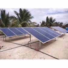 Ground-mount solar installation in rural area with coconut trees